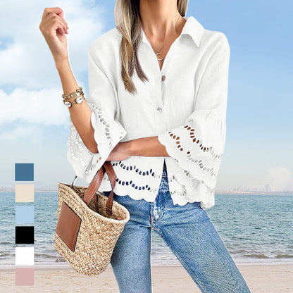 Bluse mit einfarbigem Revers, ausgestellten Ärmeln und Cut-out am Saum