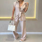 Elegantes Set aus tailliertem Oberteil und lässiger Hose