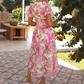 Damen Kleid mit lebhaftem Druck, V-Ausschnitt und Lochmuster