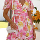 Damen Kleid mit lebhaftem Druck, V-Ausschnitt und Lochmuster