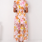 Damen Kleid mit lebhaftem Druck, V-Ausschnitt und Lochmuster