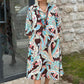 Farbenfrohes Kleid mit 3/4-Ärmeln und Vintage-Blumendruck und Taschen